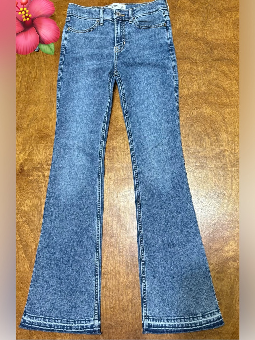 Girl’s Abercrombie Kids high rise flare leg raw hem jeans EUC